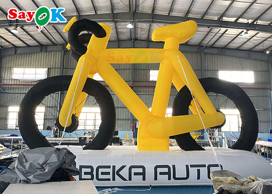 Желтый рекламируя велосипед высокой изготовленной на заказ раздувной продукции выдвиженческий модельный с печатью