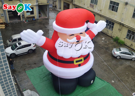 рождество раздувной Санта Клаус 8m на открытом воздухе нося красную шляпу