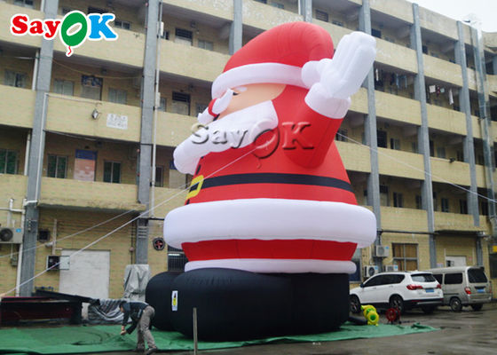 рождество раздувной Санта Клаус 8m на открытом воздухе нося красную шляпу