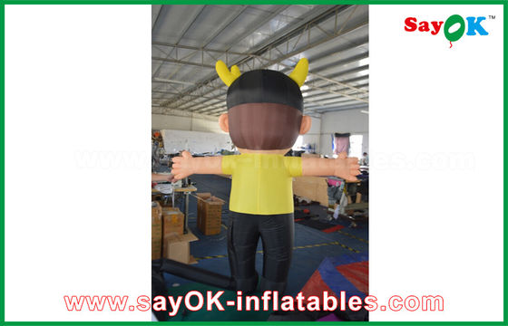 Надувные мультфильмы Оксфордская ткань Надувные мультфильмы Желтый мальчик Дети для рекламы